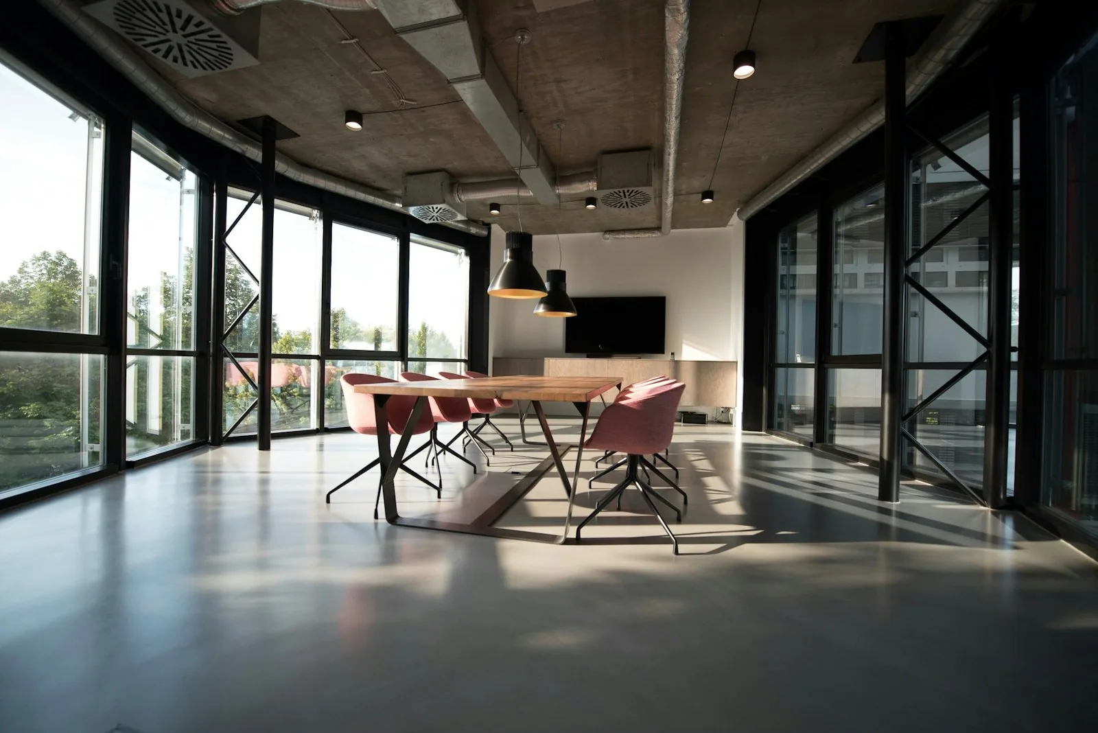 Contemporary finance advisory office with meeting and work areas